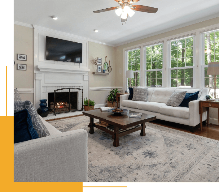 A Living Room Filled With Furniture and a Fire Place